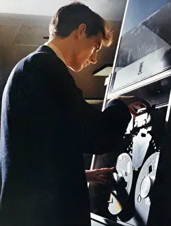 Vintage Computer Technology Drucke: Adjusting a tape storage device
