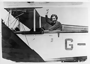 Female Aviator History Drucke: Amy Johnson in her Plane