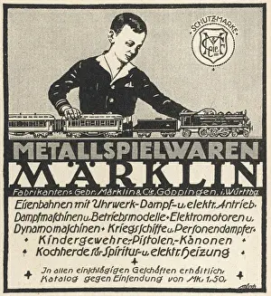 Kinder Drucke: Junge und Modellbahnfahrzeug von der Marke Marklin