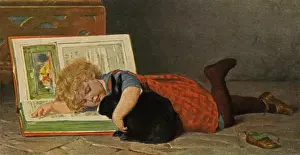 Kind mit Buch und Hase
