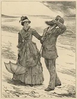 Couple On Beach Drucke: A Couple stroll along the beach