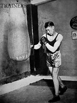 Historical Boxing Images Drucke: Dave McCleave using a punch bag, 1936