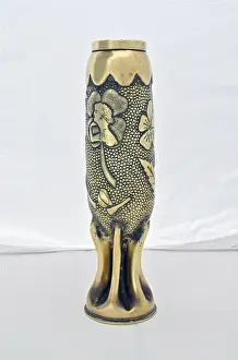 Decorated 75mm shell case with a fluted bottom