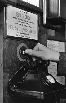 LFB Firefighting Equipment Drucke: Emergency call button in telephone box