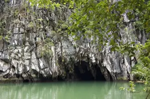 Karst Mountain Scenery Drucke: Entry to a cave that features a limestone karst