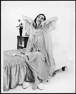 Woman Stretching In Bed Drucke: Female Model Waking Up