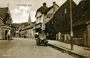 Drucke von Vor dem Straßengang in der Nähe von Seaton im Dorf Beer im County Devon in SüdwestEngland. Zeigt eine Bull's-Eye-Morris-Vintage-Karre Datum: Anfang des Jahrzehnts nach 1920 Bier Drucke: Für die Straße, Bier, Devon