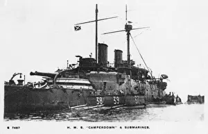 Royal Navy Battleships Drucke: HMS Camperdown with three submarines moored alongside
