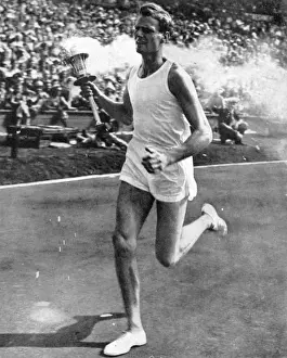Wembley Arena Events Drucke: John Mark carrying the Olympic torch, opening ceremony, 1948