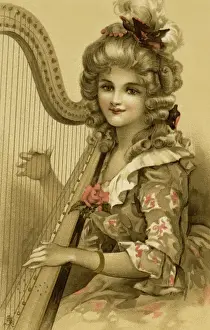 Die Dame spielt ein Harfe