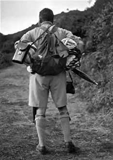 Holiday Leisure Activities Drucke: Man out walking with backpack
