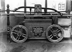 London Firefighting Service Drucke: Old Dutch fire engine in a museum