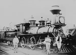 Early 20th Century Railways Drucke: An old fashioned steam train and workers
