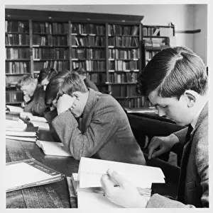 Historical Education Images Drucke: Schoolboys studying in school library