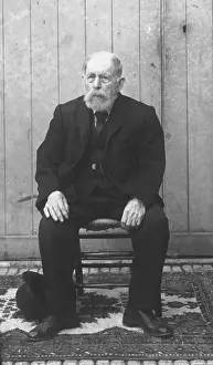 Ein sitzender älterer Mann aus Devon