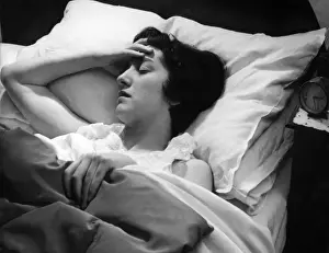 Young Woman With Headache Drucke: Sleepless Night
