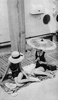 Women In Swimwear Drucke: Sun basking on board an ocean liner