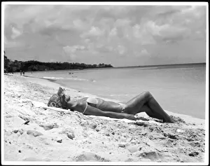 Woman In Bikini Drucke: Sunbathing on Sand