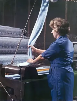 Textile Manufacturing Process Drucke: Threads entering a weaving machine