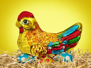 Ostern Drucke: Eierbelegter Schokoladenhähnchen mit Ostereiern - digital manipuliert Huhn