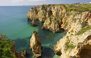 Ponta Da Piedade Cliffs Drucke: Eroding cliffs, stacks and islets at Ponta da Piedade, near Lagos, Algarve, Portugal