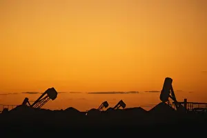 Australian Industrial Landscape Drucke: Opal mining silhouette of mining operation with blower