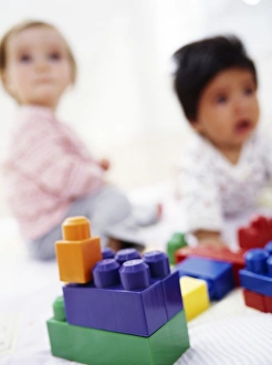 Childhood Toy Photography Drucke: Babies with building blocks