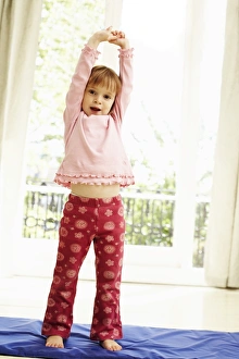 Young Girl Exercising Drucke: Childhood exercise