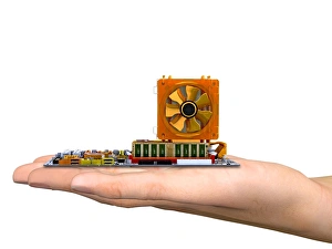 Computer Motherboard Drucke: Hand with computer motherboard, artwork