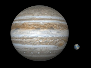 Drucke von Jupiter und Erde verglichen. Computerartwork, die den Umfang des Gasriesen Jupiter (links) mit dem der Erde (rechts) vergleicht Bilder Datiert 2010 Mai: Jupiter und Erde im Vergleich, Kunstwerk