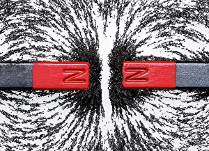 Drucke von Magnetische Abwehr. Die Eisenfäden zwischen diesen beiden Bar-Magneten zeigen die Form des abwehrenden magnetischen Feldes dazwischen Wissenschaftliche Poster: Magnetische Abwehrkraft
