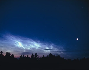 High Altitude Clouds Drucke: Noctilucent clouds with Moon