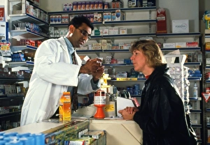 Pharmacy Treatment Drucke: Pharmacist with customer