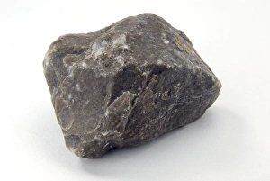 Calcium Carbonate Deposits Drucke: Sample of limestone