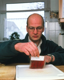 Scientist In Lab Coat Drucke: Testing for bacteria