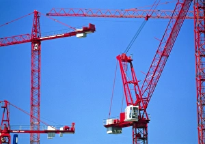 Building Site Equipment Drucke: View of cranes on a construction site