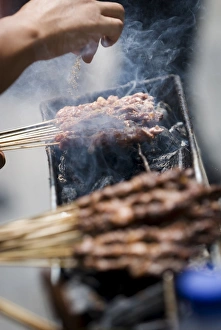 Zurücksetzen von Pfeffer auf dem Barbecue in Kunming im Bundesautlan der Provinz Yunnan in China Asien