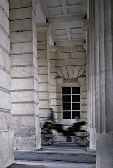 Austria Outdoor Photography Drucke: Carriage passing between classical columns, Vienna, Austria, Europe