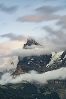 Eiger Mountain Switzerland Drucke: Clouds over Eiger mountain and green alpine valley, Murren, Lauterbrunnen