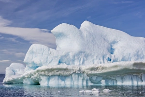 Polar Regions Travel Destinations Drucke: Clouds forming over glacial iceberg at Devil Island