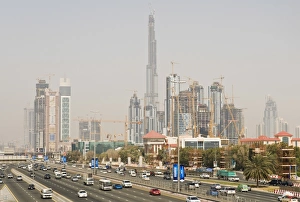 Travel Destinations In The Middle East Drucke: Construction site along Sheik Zayed Road, Dubai, United Arab Emirates, Middle East