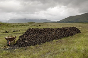 Horizontal Landscape Photography Europe Drucke: Cut peat stacked up for winter