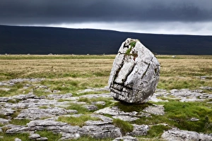 Peaceful European Scenery Drucke: Dark clouds and Standing Stone on Twisleton Scar