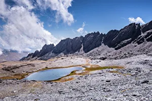 Andalusia Spain Landscape Drucke: Dramatic rugged mountain range with a lake