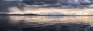 Dramatic Landscape Photography Drucke: Dramatic storm clouds over Lake Titicaca, Peru, South America