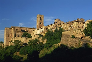 Sunset In Tuscany Italy Drucke: Evening in the old town viewed from below