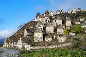 Caucasus Mountain Landscape Drucke: Exploring ancient burial structures in Dargavs