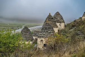 Misty Mountain Scenery Drucke: Exploring ancient structures in the city of the Dead located in Dargavs