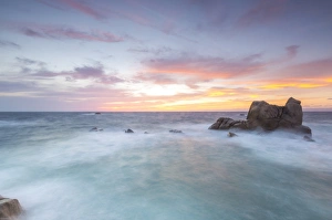Capo Testa Italy Drucke: The fiery sky frames the waves crashing on rocks, Capo Testa, Santa Teresa di Gallura