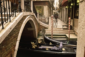 Gondola Ride Venice Drucke: Gondolas beside a bridge